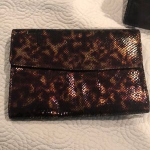 Brand new Clutch. Never worn.